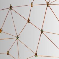 Several small cartoon representations of people are linked by brown handdrawn lines representing a network.