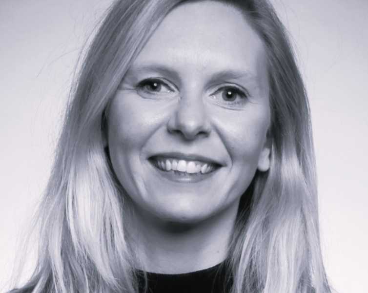 A headshot of Sophie Frost in black and white